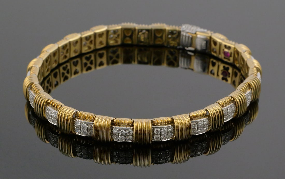 ROBERTO COIN 18k Gold Diamond Bracelet: Roberto Coin Appassionata 18k yellow and white gold bracelet by Roberto Coin, signed. About 2.3 cttw diamonds, G-H color. About 8" long. Weighs 38.5 grams. PLEASE NOTE: Credit cards will not be
