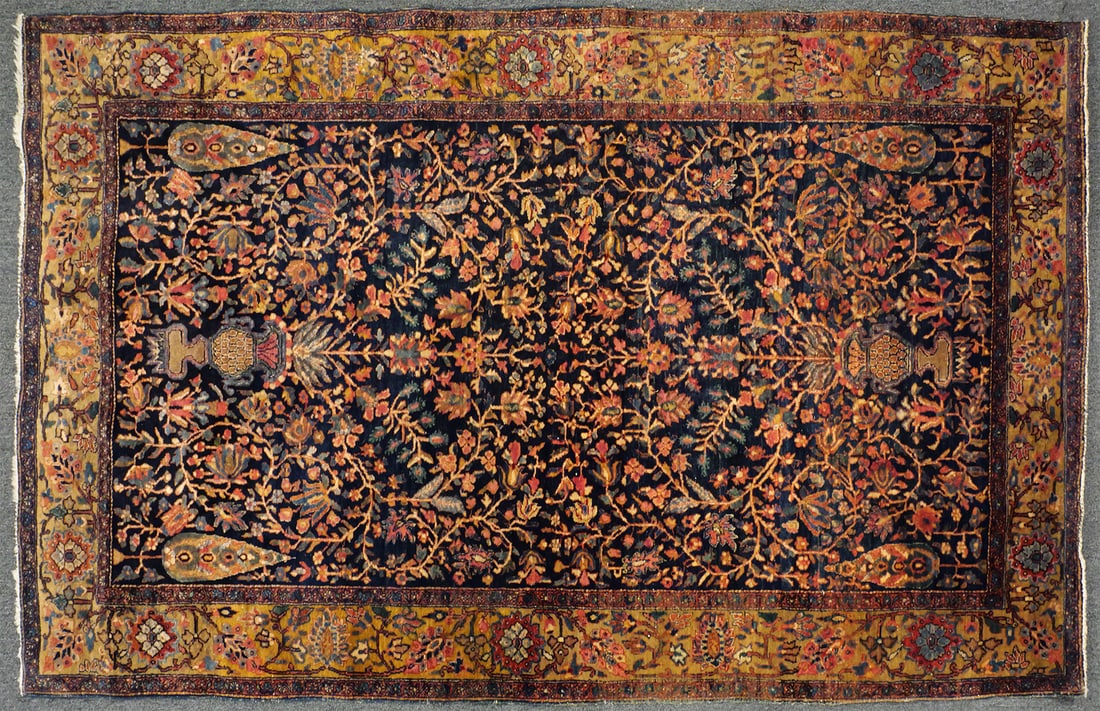 Persian Tree of Life Rug 50" x 83": Hand-knotted pile rug measuring approximately 50" x 83". Dark blue field with a vertically oriented Tree of Life pictorial composition rising from a stylized vase at the base of the field. A