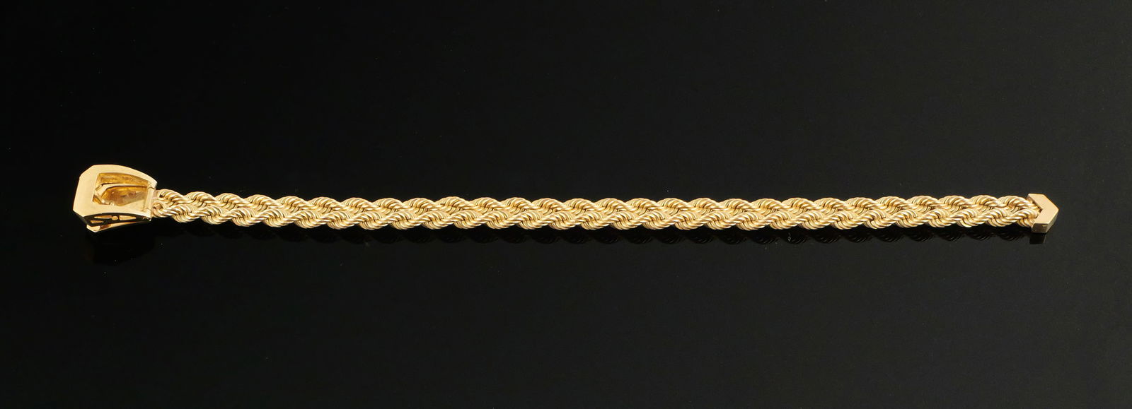 Vintage 14k Gold Belt Style Bracelet: Double rope bracelet. Fits 7" and smaller -- adjustable with belt buckle style clasp. Signed 14k gold. Weighs 22.8 grams. PLEASE NOTE: Credit cards will not be accepted for this purchase. This item