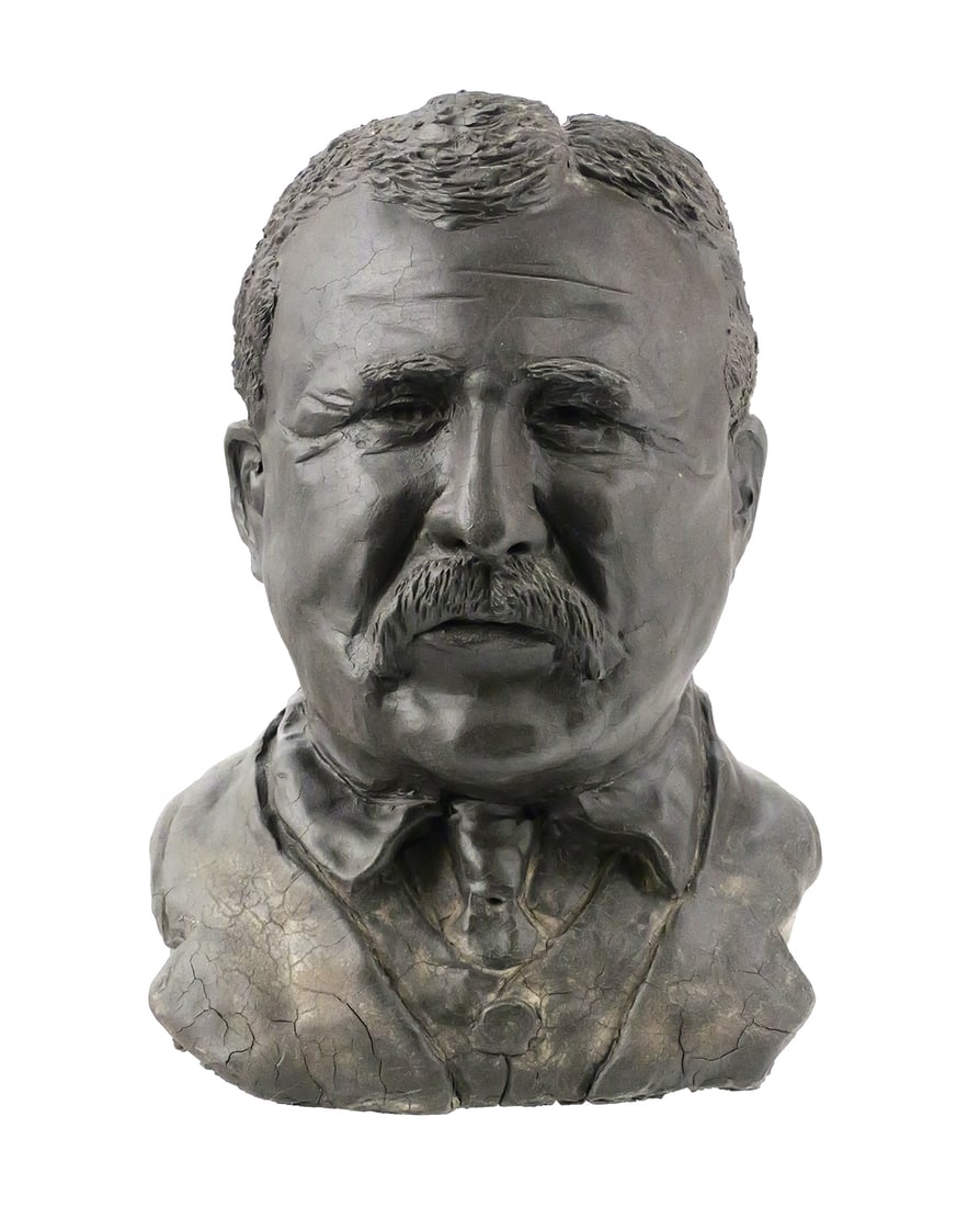 Theodore Roosevelt Clay Bust: Bust of Theodore Roosevelt executed in air-dry sculpting clay. Measures 10" tall x 7" wide x 6-1/2" deep. Signed on the base RS Brown and dated 12-5-93. This item will need to be shipped by a packing
