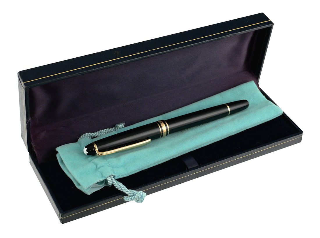 Tiffany Montblanc Pen w/ Case: Tiffany & Co. Montblanc Meisterstuck ballpoint pen. Black with gold trim. Original box and blue felt drawstring bag. This item can be shipped in-house. Multiple lot combined shipping may require 3rd P
