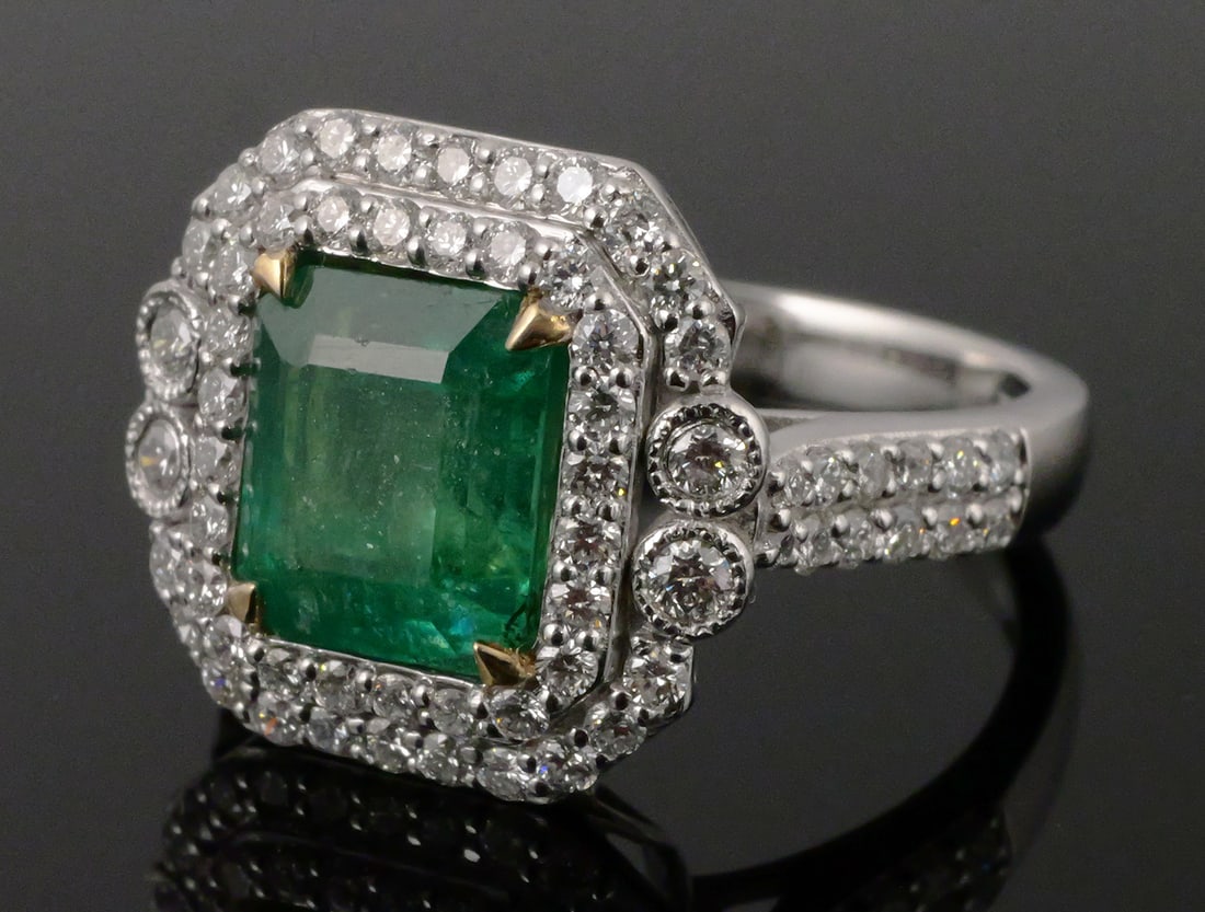 Platinum & 18K Emerald Diamond Ring: Platinum and 18K yellow gold two-tone ring set with one natural Zambia emerald beryl, octagonal step cut, 2.51 carats, measuring 8.33 x 7.28 x 5.19 mm. Emerald accompanied by GIA Emerald Origin