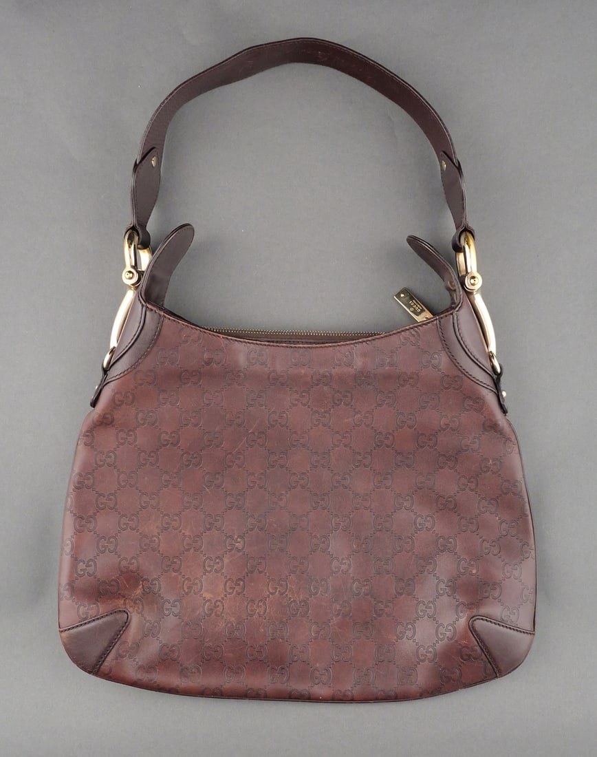 Vintage Gucci Brown Leather Hobo Handbag: Vintage Gucci Brown Leather Hobo Handbag. Brown Guccissima leather Horsebit Creole hobo bag. Serial #145826 2123. Bag measures approx. 14" wide x 10 1/2" x 2 3/4". This item can be shipped in-house.