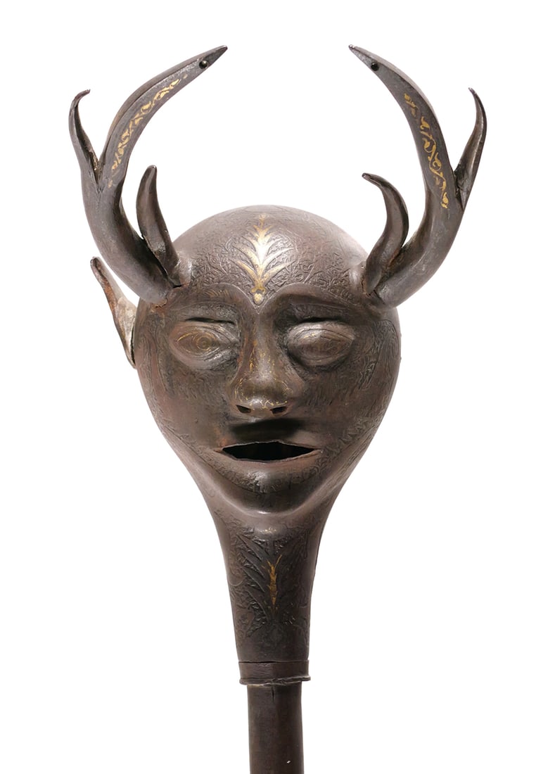 Antique Qajar Ceremonial Mace: 19th century ceremonial mace. Tubular shaft surmounted with a heavily chased horned devil's head with gilt accents, presumed to be steel. Not meant as a weapon, despite the weight, these ceremonial