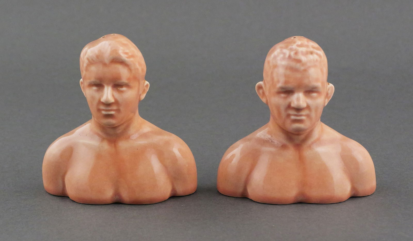 Dempsey Tunney Boxing Salt & Pepper Shakers: Gene Tunney vs. Jack Dempsey Long Count vintage novelty ceramic salt and pepper shakers commemorating the famous 1927 Chicago rematch. Modeled as a portrait bust of each of the famous Heavyweight