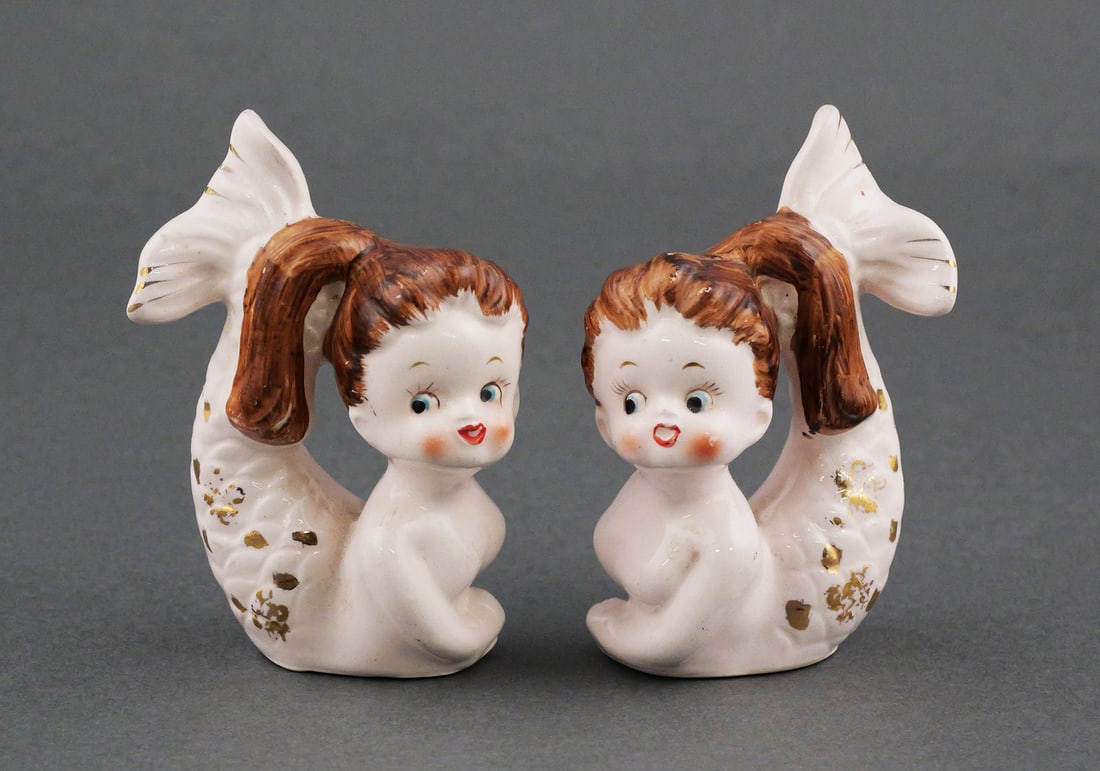 Relco Mermaid Salt & Pepper Shakers: Pair of vintage mid century ceramic mermaid girl novelty shakers by Relco. Approx. 3-1/2"H. This item can be shipped in-house. Multiple lot combined shipping may require 3rd Party shipping.