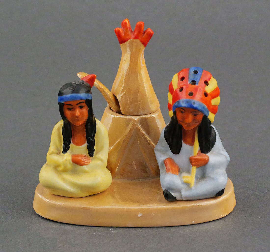 Vintage Condiment Set Native Americans: Vintage early or mid 20th century novelty character condiment set with mustard pot, original spoon, and salt and pepper shaker set. Orange lustre base with teepee and two Native American Indians sitti