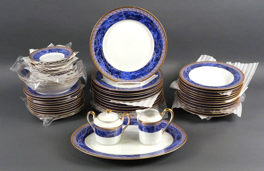 52 Pieces Christian Dior Azure Royale China: 50 Pieces of Vintage Christian Dior Azure Royale China Cobalt and Gold. Includes 12 dinner plates, 12 soup bowls, 11 salad / dessert plates, 12 saucers, 1 serving platter, 2 serving bowls, 1 creamer
