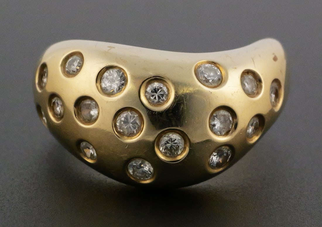 14k Gold Trisko Bombe Diamond Ring: Signed Trisko, size 7-1/2. Gypsy set diamonds, about .54 cttw, VS1 and G color. Weighs 9.3 grams. This item can be shipped in-house. Multiple lot combined shipping may require 3rd Party shipping.