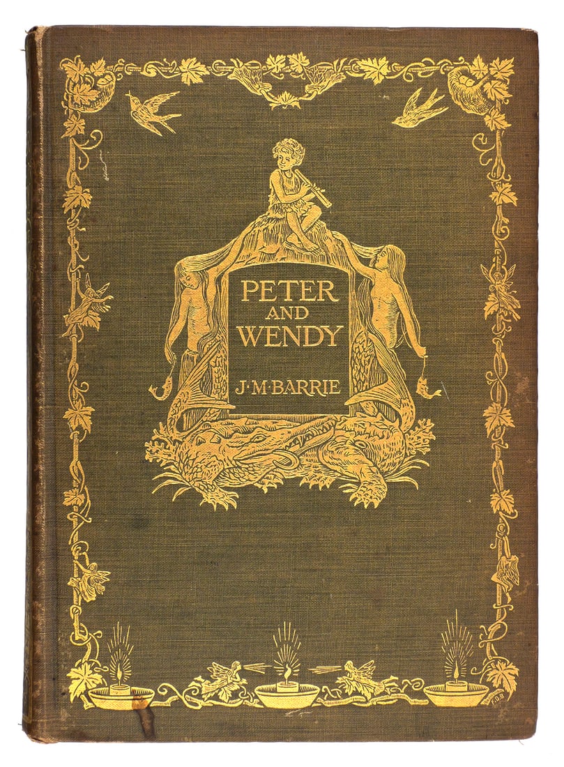 JM BARRIE Signed PETER PAN Book 1st Ed.: Peter and Wendy first edition hardcover, by J.M. Barrie, illustrated by F.D. Bedford. New York: Charles Scribner's Sons, 1911. Front endpaper with a card for Mr. Isaac Frederick Marcosson inscribed