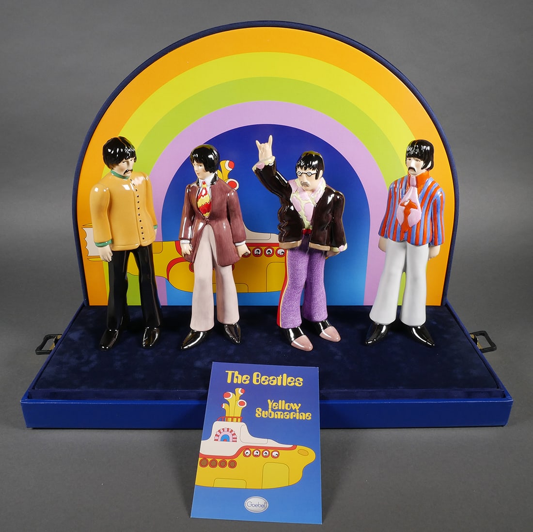 Goebel BEATLES Yellow Submarine Set NIB: Limited edition Beatles Yellow Submarine set of porcelain figures set by Goebel. Numbered 1,026 of 1,968. Original box and slipcover. Box measures 19"x 15-1/4" x 8-1/2". Unused and mint, inside and