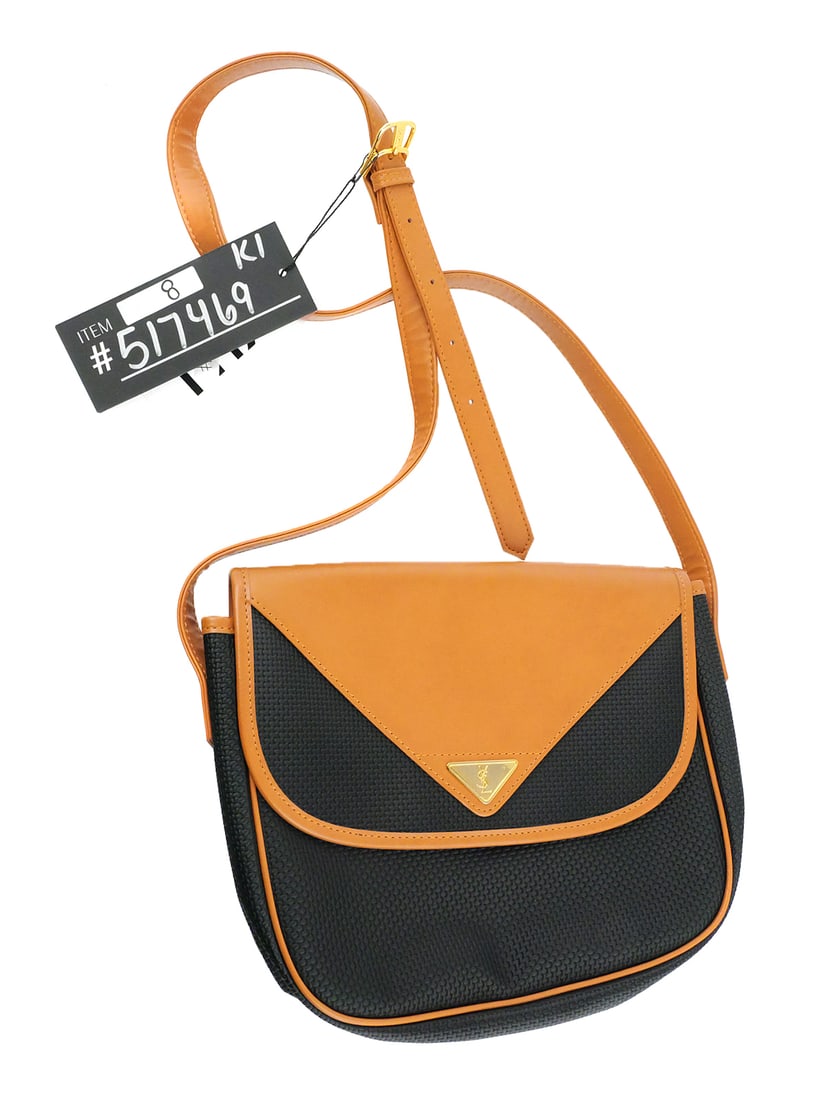 Vtg Yves Saint Laurent YSL Triangle Crossbody Bag: Vintage Yves Saint Laurent YSL Triangle Logo Crossbody Bag. Measures about 10" x 8" x 3". Unconditionally guaranteed to be authentic. This item can be shipped in-house. Multiple lot combined shipping