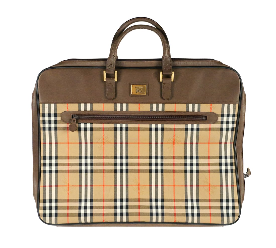Burberry Garment Bag: Burberrys Garment Bag. Measures approx 21" x 17". Unconditionally guaranteed to be authentic. This item can be shipped in-house. Multiple lot combined shipping may require 3rd Party shipping.
