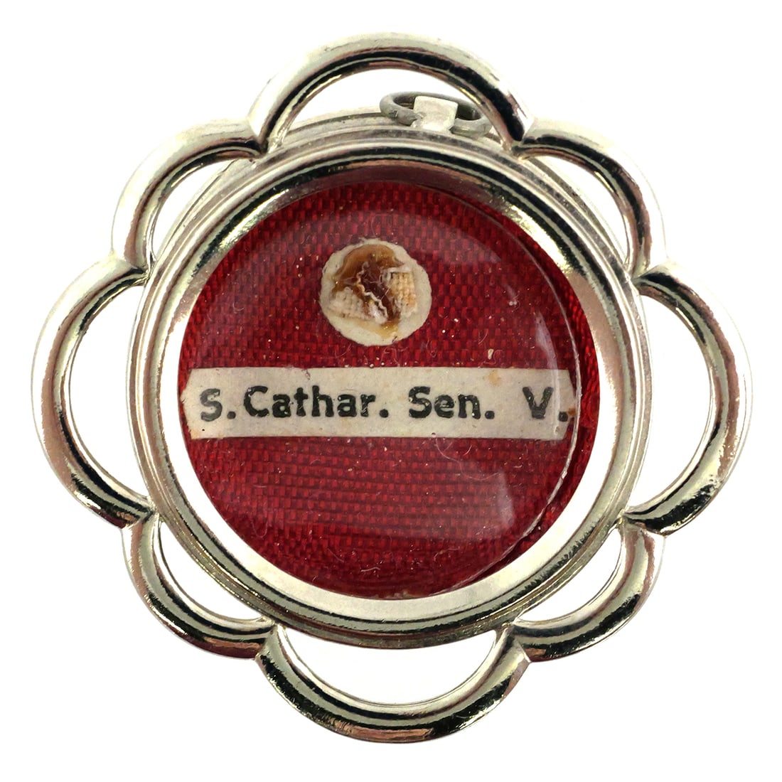 Saint Catherine of Siena Relic: Saint Catherine of Siena (1347-1380) was a 14th-century Italian mystic, Dominican tertiary, and Doctor of the Church. Metal reliquary theca with bail for hanging. Approx. 1-1/4"Dia. This item can be s