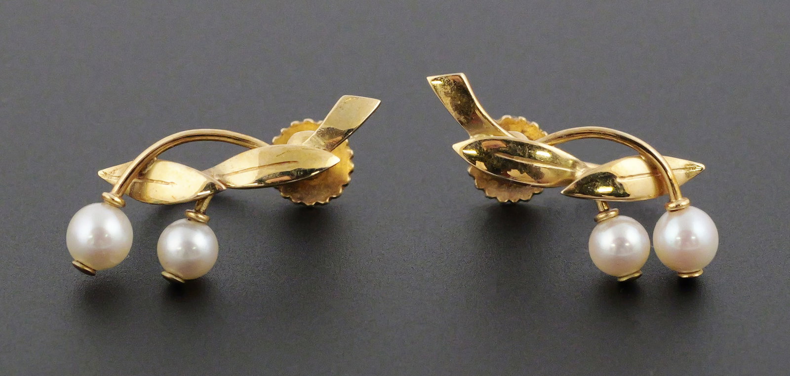 14k Gold Pearl Earrings, Braemer Jensen: Vintage pearl earrings in 14k yellow gold. Hallmark "Br. J." believed to be Braemer Jensen. Total weight 3g. This item can be shipped in-house. Multiple lot combined shipping may require 3rd Party shi