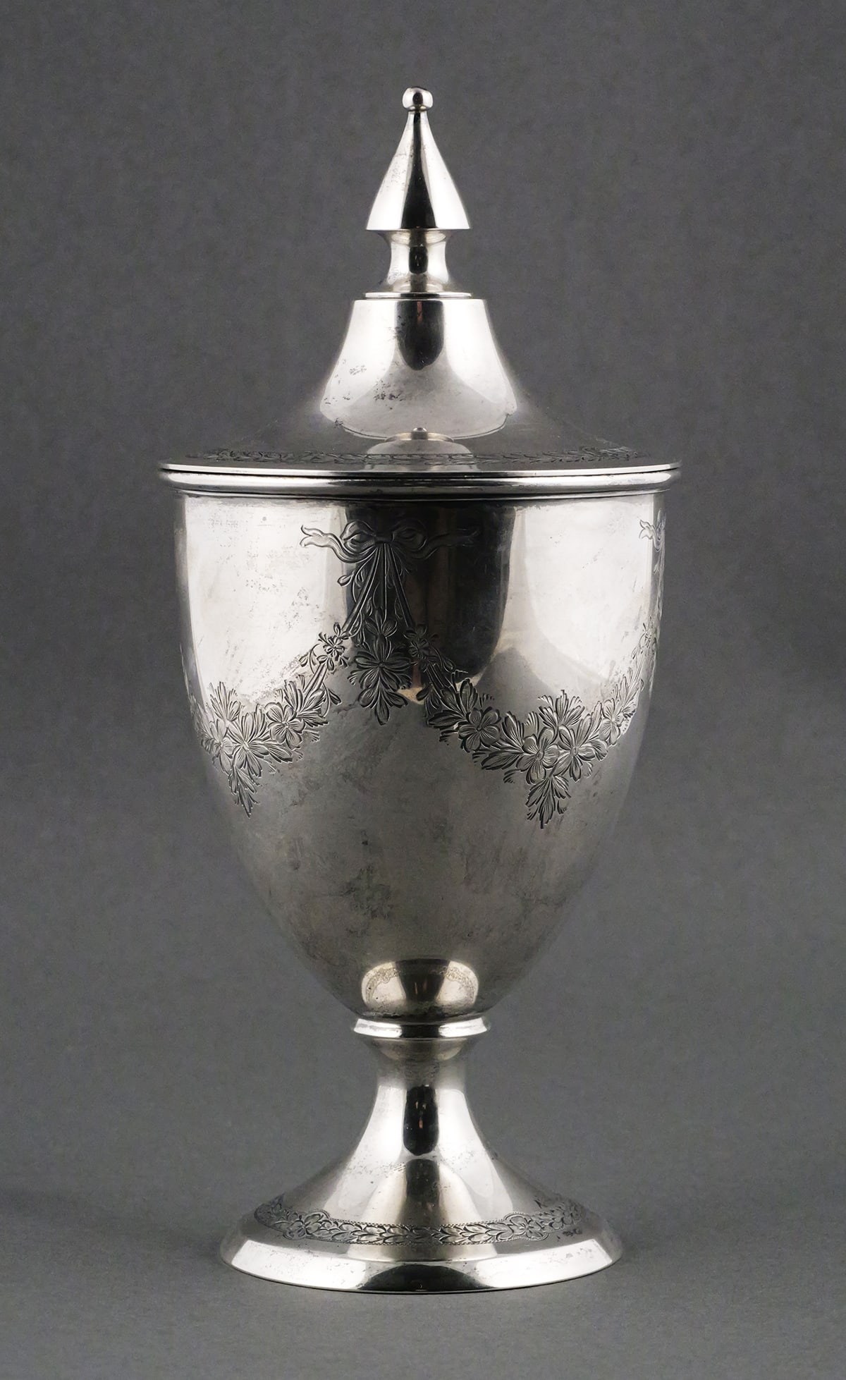 Antique Sterling Silver Lidded Mantel Urn: Hallmarked Blackinton, circa 1900-1910. Measures 9-1/2" high, weighs 9.9 Troy ounces. This item can be shipped in-house. Multiple lot combined shipping may require 3rd Party shipping.