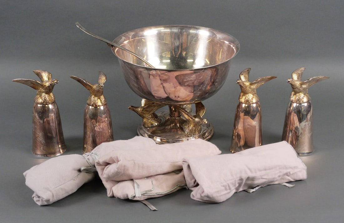 Anheuser-Busch Punch Bowl, Stirrup Cups, Flatware: Silver plated punch bowl, ladle, 4 stirrup cups and flatware service for 8, including 4 service utensils. All pieces have branding for Budweiser parent company Anheuser-Busch, including applied or