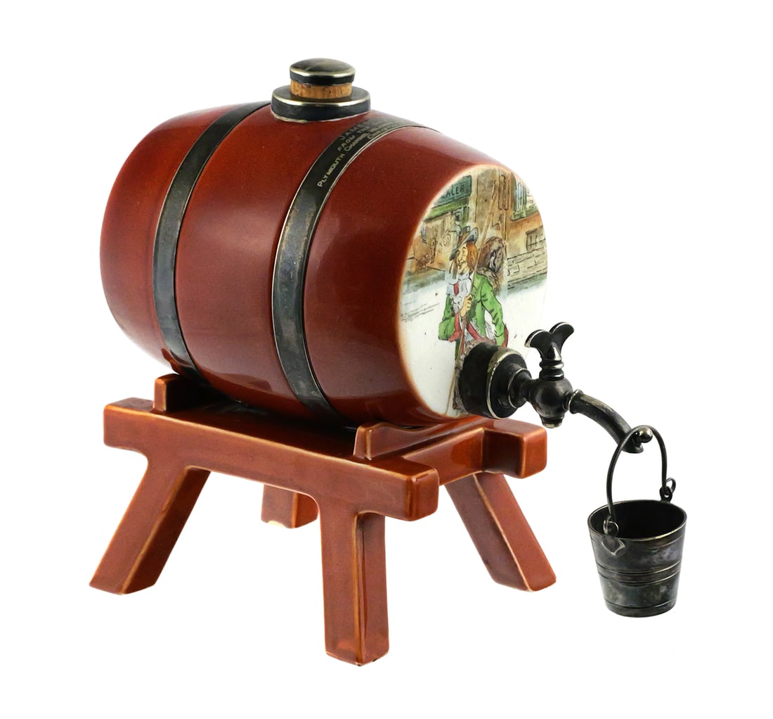 Rare Doulton Dickens Whisky Spirits Barrel: Charles Dickens series Royal Doulton whiskey barrel decanter. Engraved strap between cork cap and spigot reads "James H. Thorne, from the directors of the Plymouth, Channel Islands and Brittany SS