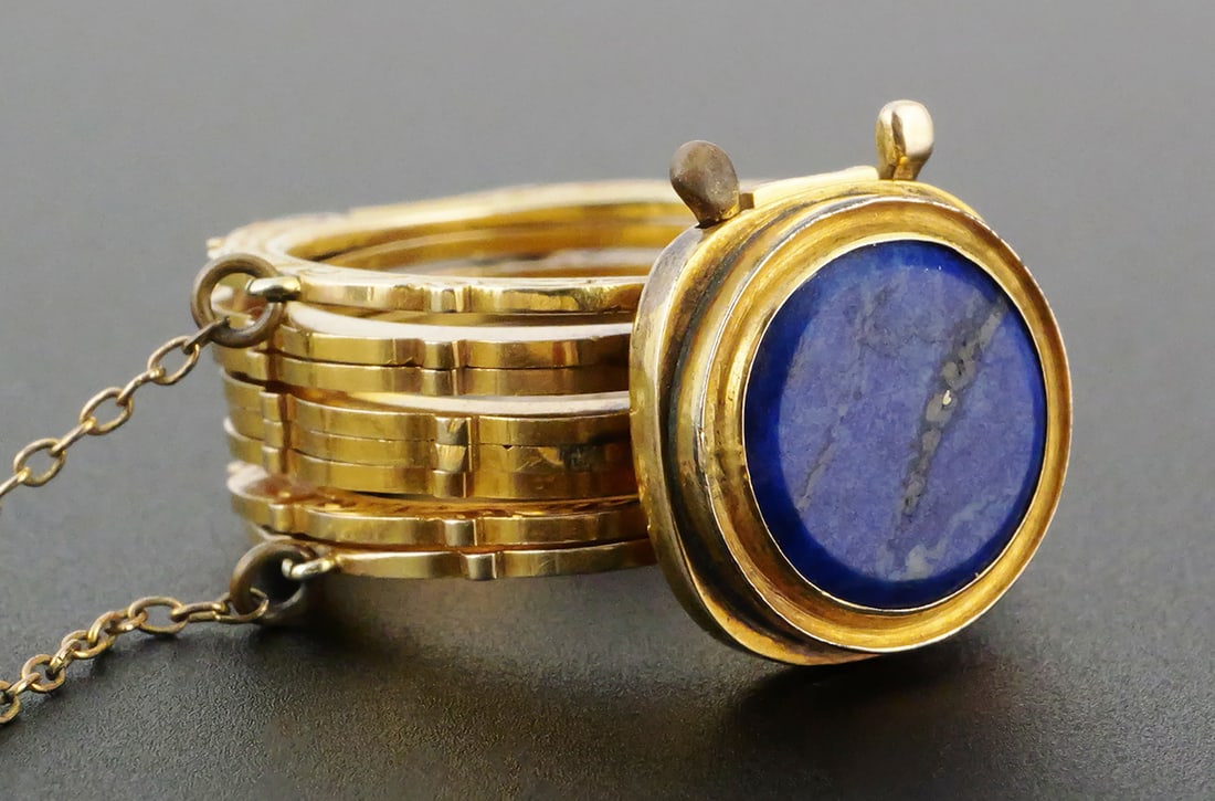 19C Victorian Convertible 14k Gold Ring Bracelet: Scarce and unique piece of mid-Victorian era jewelry: a ring that converts to a bracelet. Each side of each segment has ornate engraved designs. Unsigned, but tested to be 14k-15k gold. A round, flat