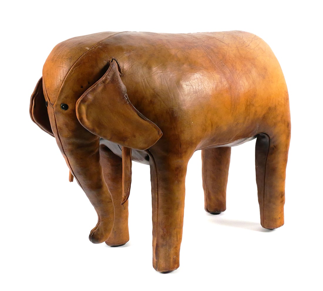 Vintage Leather Elephant Footstool Dimitri Omersa: Vintage leather elephant ottoman footstool attributed to Dimitri Omersa for Abercrombie and Fitch. Measures approx 22" long, 17" tall, 9" wide. This item will need to be shipped by a packing company