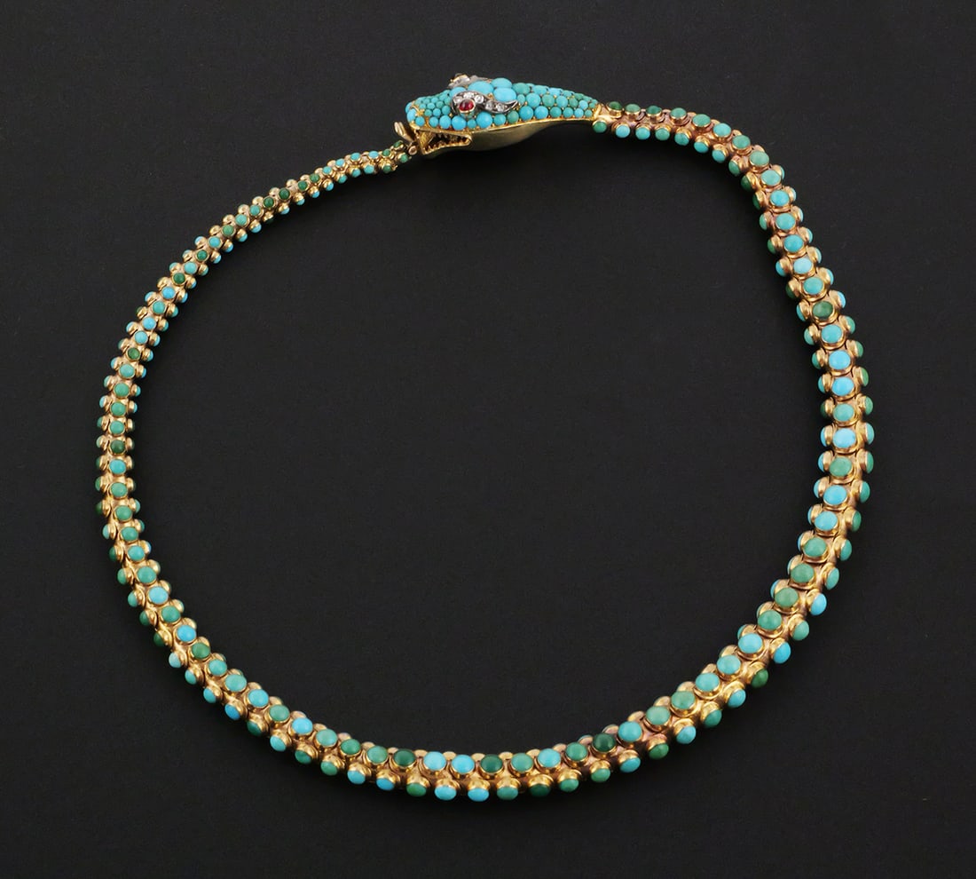 Rare 19C Gold Jeweled Serpent Necklace: Antique mid-Victorian snake necklace. Purity ~15k, with 329 turquoise cabochons, bezel and bead set along articulated body. Eyes are bezel-set ruby cabochons, and eyebrows are lined with 10 rose cut