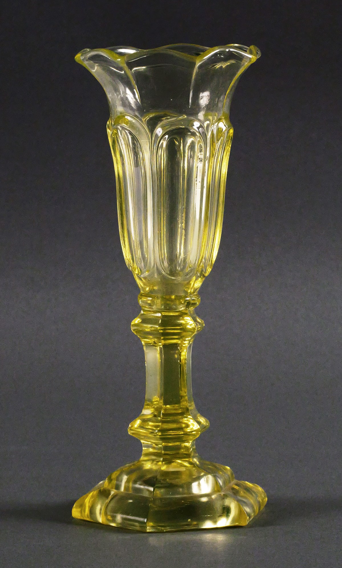Boston & Sandwich, Loop, Flint Glass Vase: Scarce mid-19th century canary yellow loop pattern Sandwich vaseline glass vase. Fluoresces dramatically under UV light. Measures about 10-5/8" high. Gauffered rim. Hexagonal baluster stem. This piece