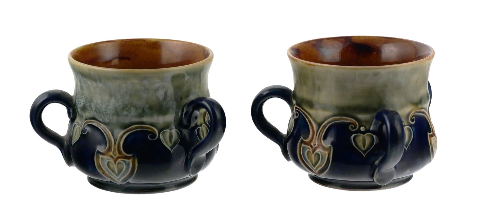 Pair Royal Doulton Maud Bowden 3 Handle Mugs: Pair of Royal Doulton Maud Bowden Art Nouveau 3 Handle Loving Cups Mugs, 1920s. Measure approx 3" tall, 3-1/4" diameter. This item can be shipped in-house. Multiple lot combined shipping may require