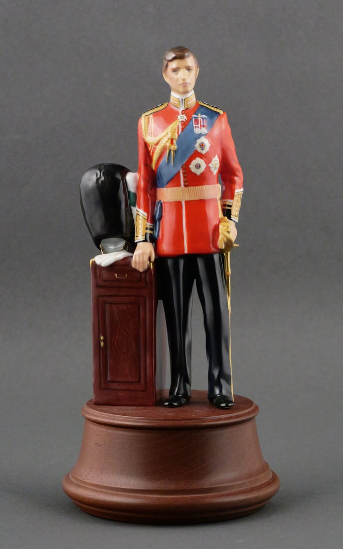 Royal Doulton, Charles, Prince Of Wales, 1981: Royal Doulton, Charles, Prince Of Wales, Number HN2884. From 1981, Numbered 545/1500. Designed by EJ Griffiths. Measures approx 8" tall (10" tall with base). Signed on bottom by Michael Doulton (5th G