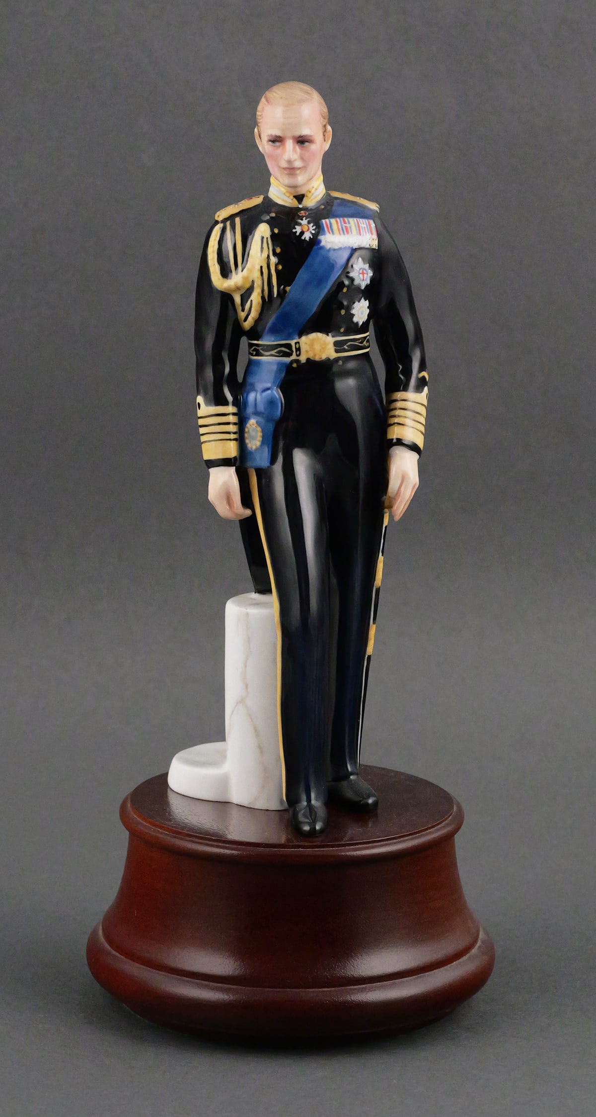 Royal Doulton, Philip, Duke of Edinburgh, 1981: Royal Doulton, Prince Philip, Duke of Edinburgh, Number HN2386. From 1981, Numbered 345/1500. Designed by Peggy Davies. Measures approx 8" tall (10" tall with base). Signed on bottom by Michael Doulto