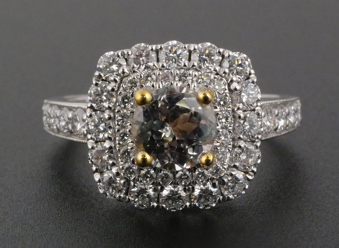 Platinum 18K Alexandrite Diamond Ring: Two-tone platinum (.900) and 18K yellow gold ring set with one GIA-certified natural color-change alexandrite (natural chrysoberyl) weighing approximately 1.12 carats, round brilliant cut, exhibiting 