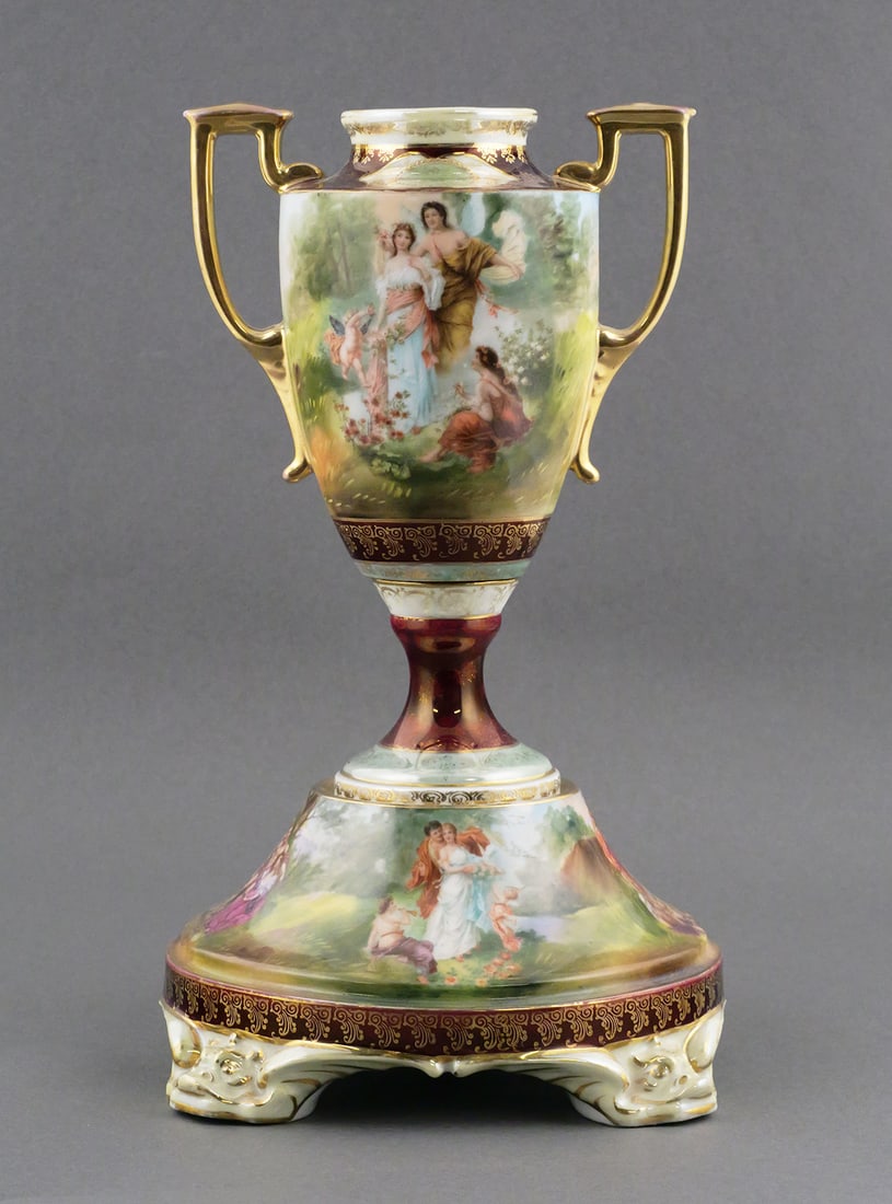 Royal Vienna Style Art Nouveau Amphora Open Urn: Royal Vienna Style Austrian Art Nouveau Amphora Form Open Urn on Pedestal Base. Measures approx 12" tall, 6-3/4" wide. This item will need to be shipped by a packing company of your choice. We maintai
