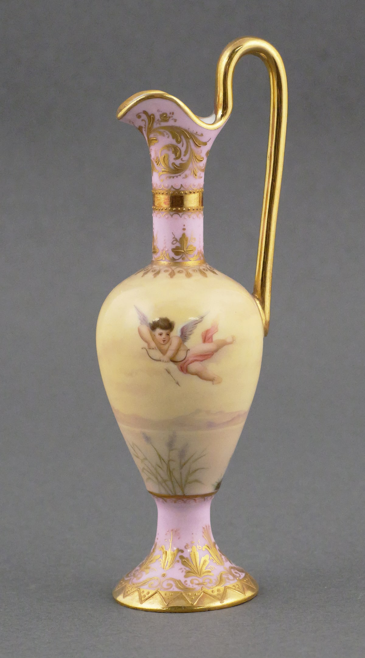 Royal Vienna Porcelain Hand Painted Bud Ewer: Royal Vienna Porcelain Hand Painted Bud Ewer Vase. Blue beehive stamp on base. Measures approx 5-3/8" tall. This item can be shipped in-house. Multiple lot combined shipping may require 3rd Party ship
