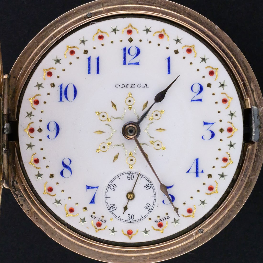 Omega 15J Gold-Filled Pocket Watch: Omega manual-wind pocket watch in a Wadsworth gold-filled hunter case measuring 35 mm in diameter, housing a 15-jewel movement adjusted to two positions, movement serial no. 4063217. White enamel dial