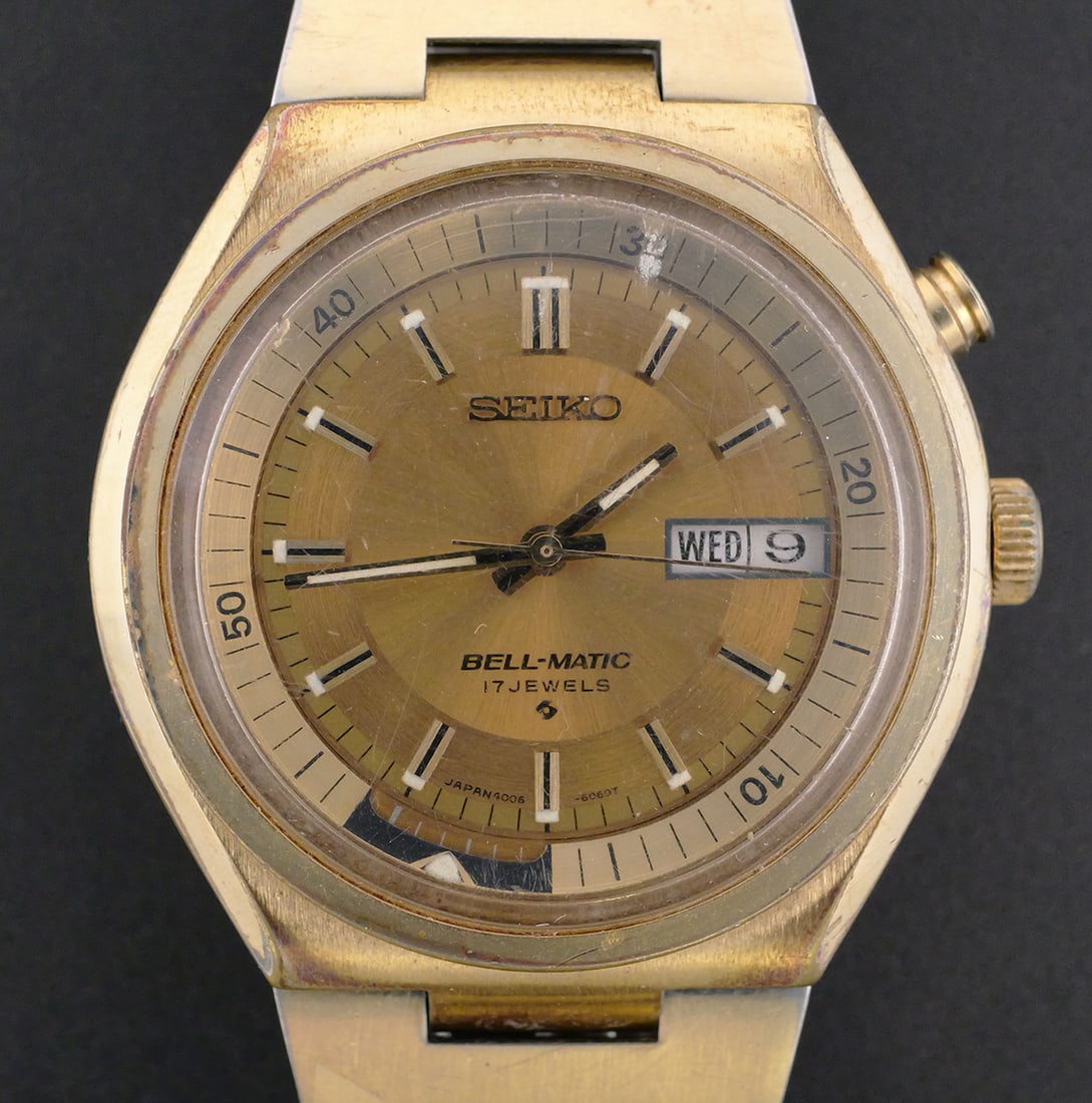 Seiko Bell-Matic Alarm Wristwatch: Seiko Bell-Matic automatic alarm wristwatch with a 39 mm gold-tone case, 17-jewel movement, gold-tone dial with applied baton hour markers and day-date display. Stainless steel screw back marked ref. 