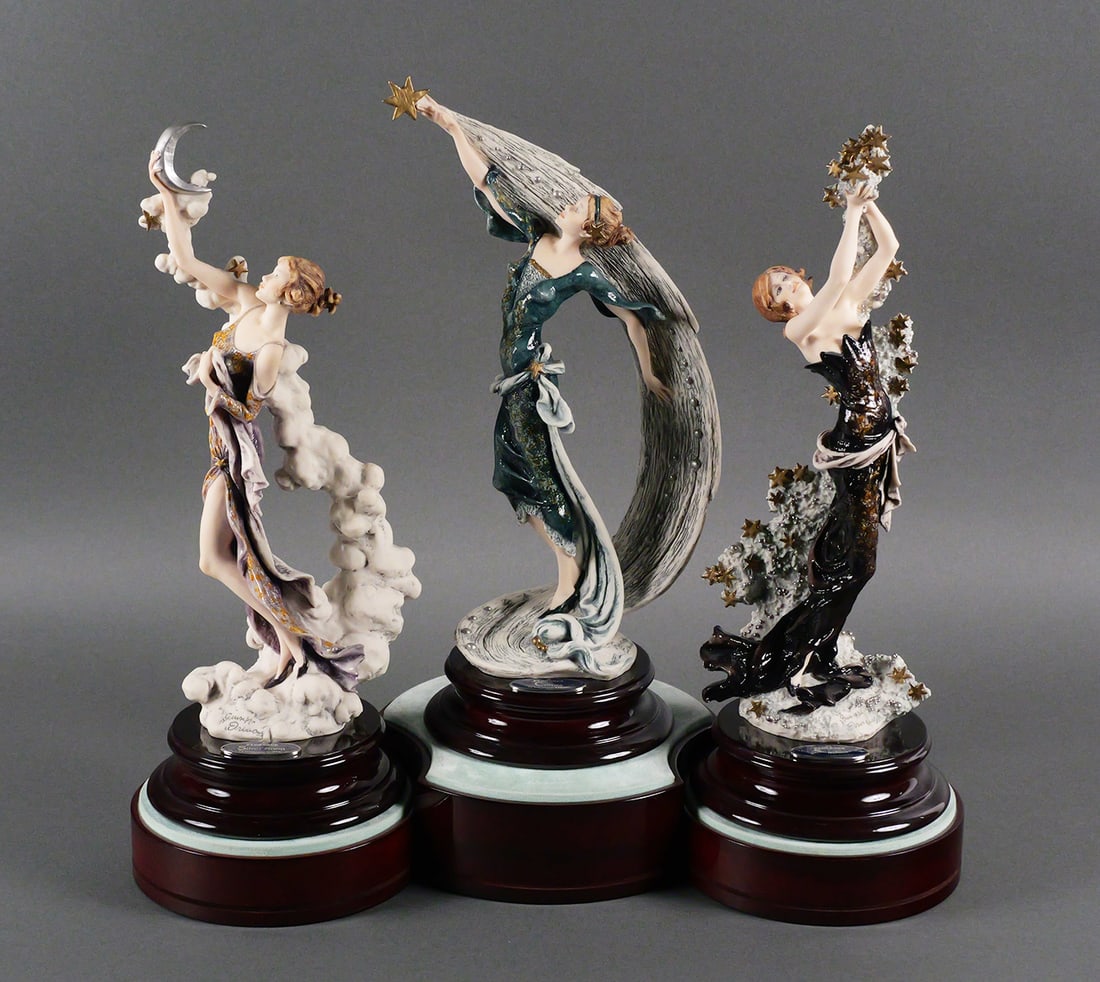 Guiseppe Armani Millennium Trio: Limited Edition set of Guiseppe Armani Millennium Starlight Figurines with display stands and certificates of authenticity. "Stella Cometa (Comet - The Future) 1275/C, "Lune Argentata" (Silver Moon - 