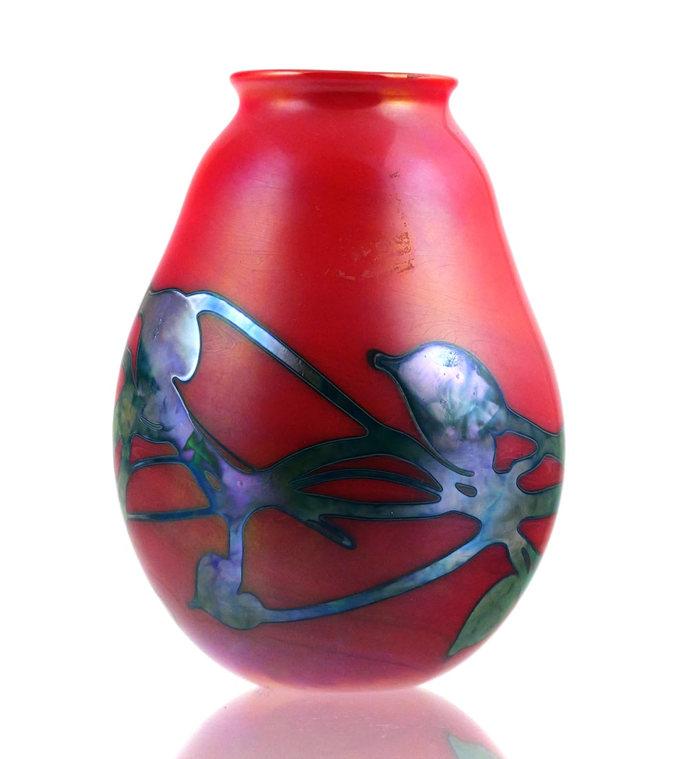 CHARLES LOTTON Red Art Glass Vase: Dated 1978 vase by Charles Lotton (American, 1935-2021). Signed on bottom. Vibrant red body with iridescent foliate designs. Measures about 5-1/2" high. This item can be shipped in-house. Multiple lot