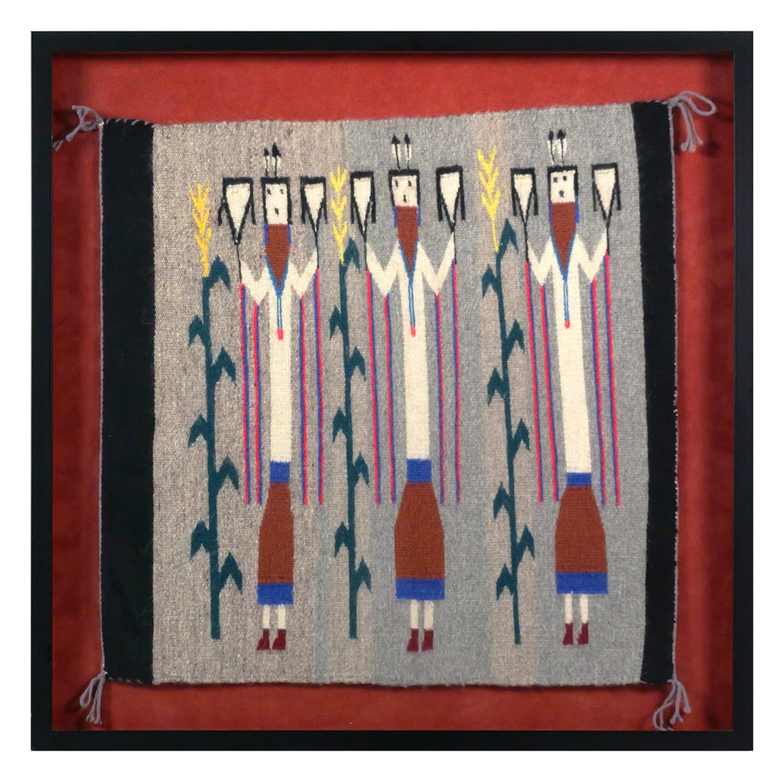Vintage Navajo 3 Figure Yei Rug: Vintage Navajo Rug featuring 3 Yei figures with corn stalks and feathers. Rug measures approx 21" x 22", frame 27" x 27". This item will need to be shipped by a packing company of your choice. We main