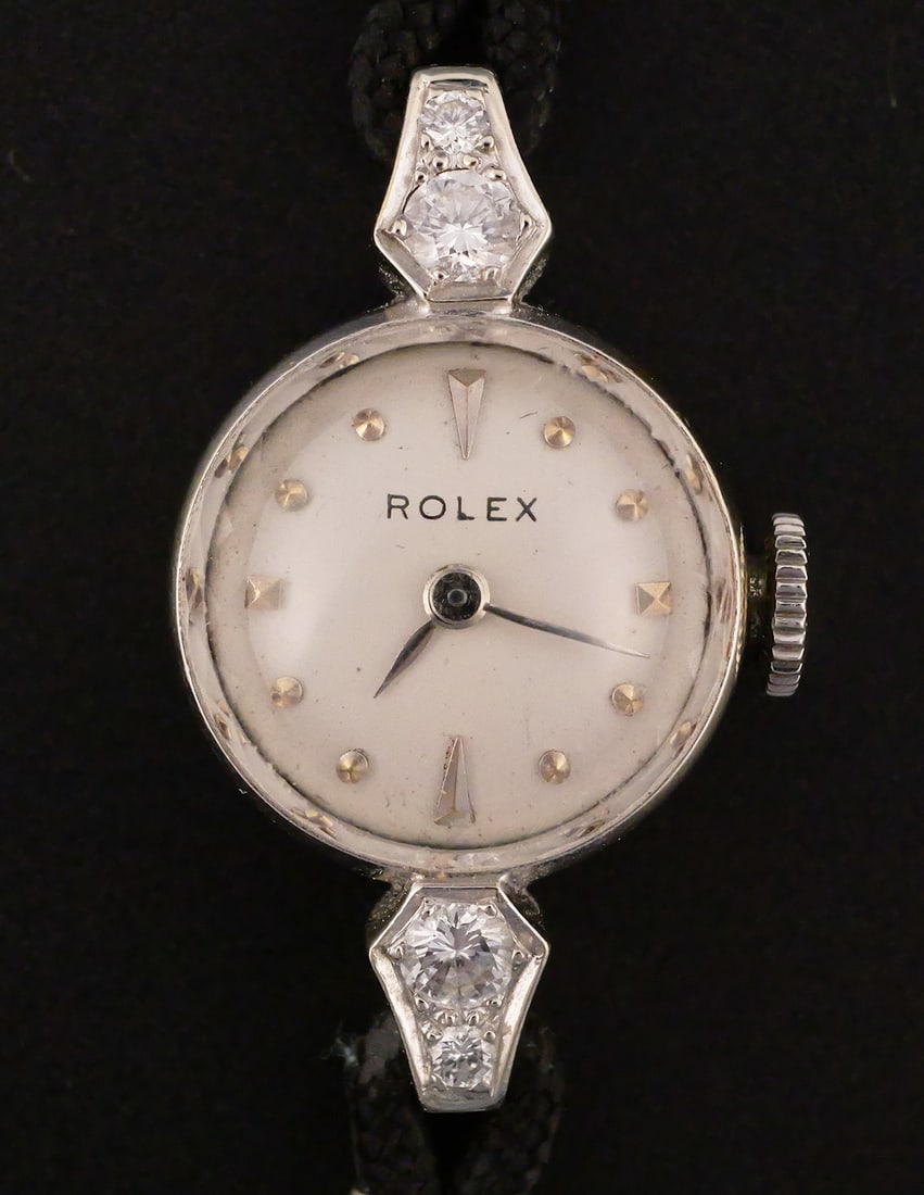 18K White Gold & Diamonds Ladies Rolex Watch: 18K White Gold & Diamonds Ladies Rolex Watch, dated 1959. Measures approx 5-3/4" end to end. This item can be shipped in-house. Multiple lot combined shipping may require 3rd Party shipping.