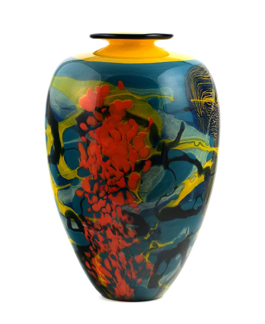 James Nowak Studio Art Glass Vase 15": James Nowak (American, b. 1956), large blown studio art glass vase with multicolor abstract and floral decoration in blue, yellow, green, orange and black. Signed "Nowak." Approx. 15" tall x 10"