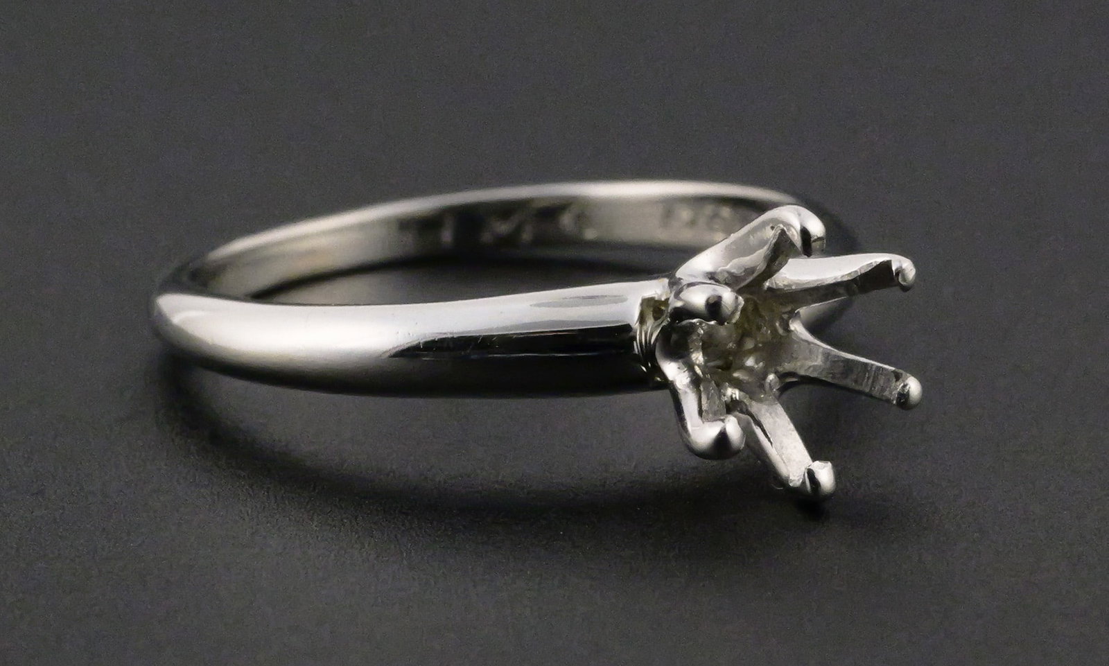 Platinum 950 Tiffany & Co Ring: Platinum 950 Tiffany & Co Ring. Engraving inside reads "CVL HMC December 22, 1961". No stone. Weight approx 4 grams. Size 7. This item can be shipped in-house. Multiple lot combined shipping may