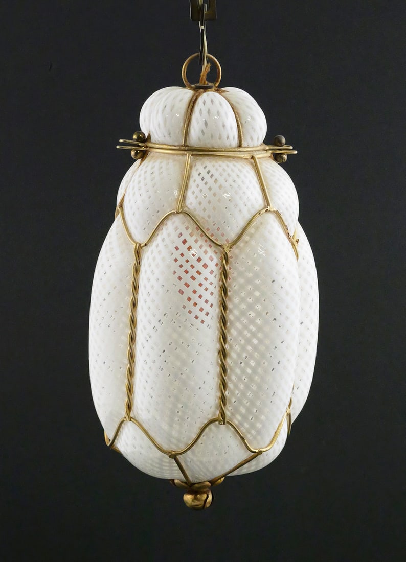 Venetian Lantern Hand Blown Murano Reticello Glass: 1940's Venetian Lantern Handblown Murano Reticello Glass in brass cage. Measures approx 13-1/2" tall, 8" wide, chain is 4". This item will need to be shipped by a packing company of your choice. We