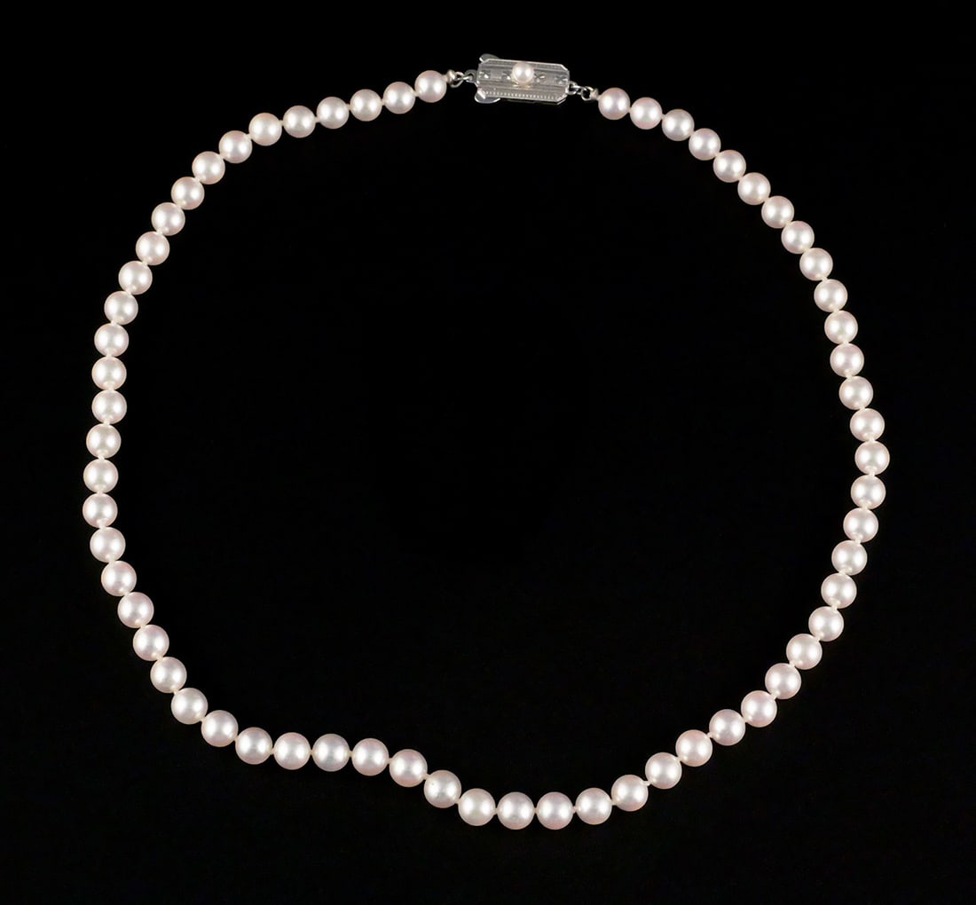 Mikimoto Single Strand Pearl Necklace Silver Clasp: Mikimoto Single Strand 5.5mm Pearl Necklace with Silver Clasp. Measures approx 16-1/2" long end to end. This item can be shipped in-house. Multiple lot combined shipping may require 3rd Party shipping