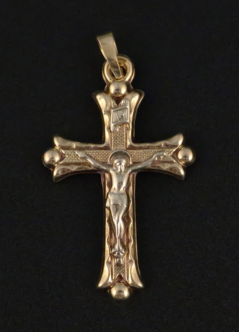 14K Gold Crucifix Pendant: Small 14K gold crucifix pendant with applied contrasting corpus and INRI plaque, approximately 1" long. Reverse stamped "B 14K P." This item can be shipped in-house. Multiple lot combined shipping