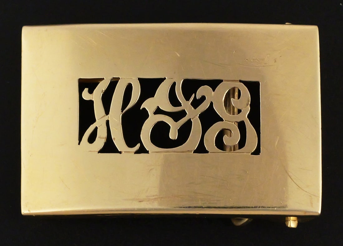 14K Yellow Gold Belt Buckle: 14 karat yellow gold belt buckle. 18.4 grams tw, approx. 1-7/8"L. This item can be shipped in-house. Multiple lot combined shipping may require 3rd Party shipping.