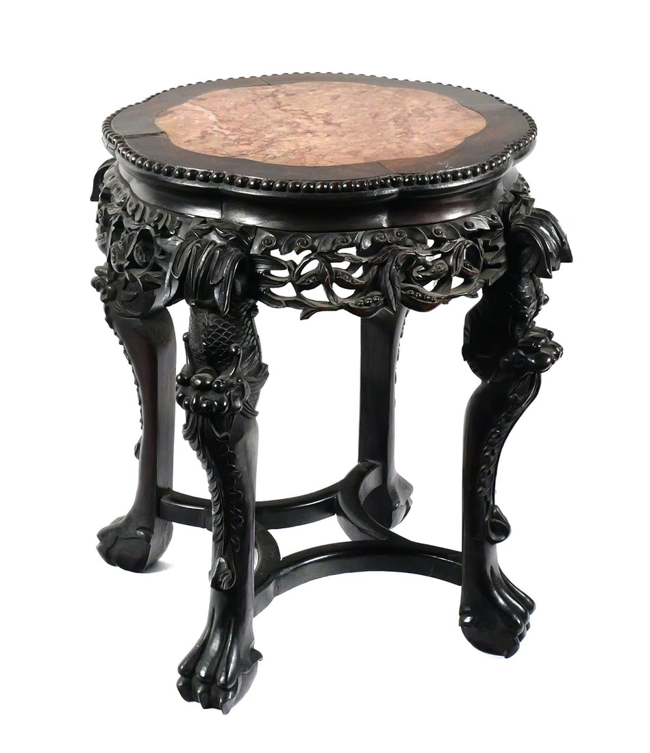 Chinese Qing Carved Dragon Marble-Top Table: Chinese late Qing dynasty carved hardwood table with variegated pink marble inset top and beaded border. Pierced foliate apron above four cabriole legs carved with dragon heads and scaled bodies, term
