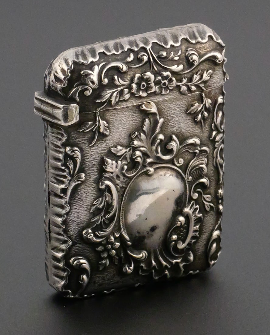 Antique French Silver Match Safe W/ Pierrot: Early 20th century pyrogen depicting a scene from the 1902 French film "Aubade a la Lune" with Pierrot serenading the moon. Reverse with reserve that is open with no monogram. Distorted mark but