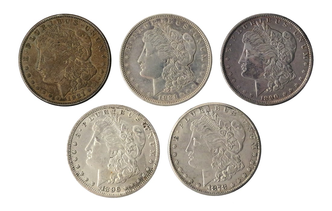 (5) Morgan Silver Dollars 1878-1921: Group of five U.S. Morgan silver dollars comprising 1878, 1890, 1896, 1921-D and 1921-S issues. 90% silver. This item can be shipped in-house. Multiple lot combined shipping may require 3rd Party ship