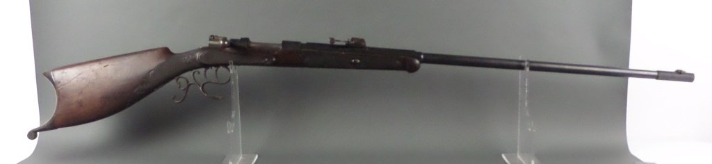 1889 FN Herstal Liege Bolt Action Rifle Ornate Stock: Fancy "sporterized" FN bolt action rifle, probably originally a military issue weapon, brought home and decked out with fancy furniture, engraving and a set/hair trigger. I believe it is a Belgian Mau