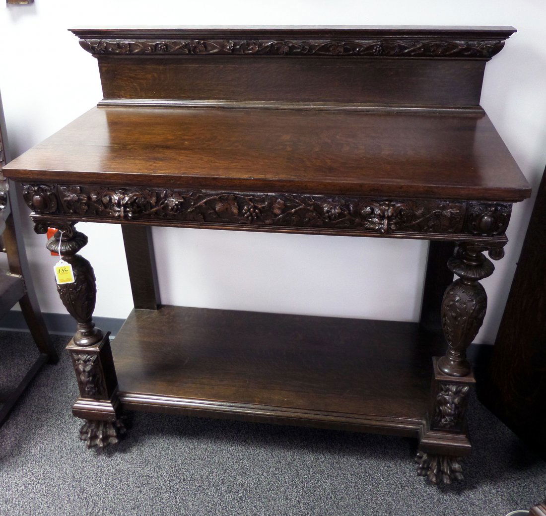 RJ HORNER Carved Grapes & Lions SERVER: Carved two-door china cabinet, probably by R.J. Horner, part of a dining room set being offered in today's sale. Decorated with grapevines, grape clusters, and lions' heads. Very fine, restored profes