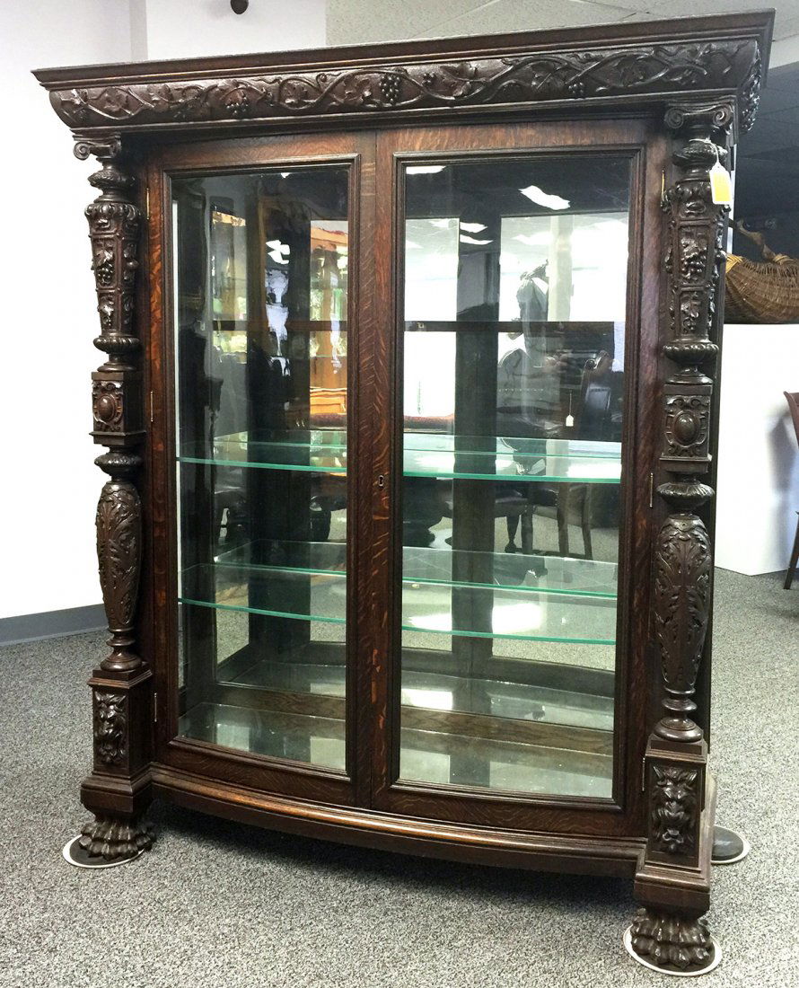 RJ HORNER Carved Two-Door CHINA CABINET: Outstanding carved two-door china cabinet, probably by R.J. Horner, part of a dining room set being offered in today's sale. Grapevine motif. Very fine, restored professionally. (From the estate of a